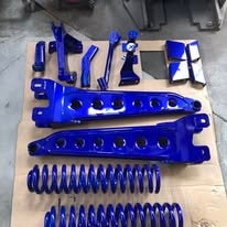 Blue powder coated truck suspension parts laid out